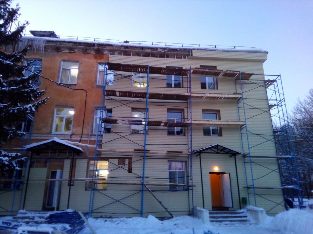 Отделка фасада здания больницы металлическим сайдингом. п. Ленинский.